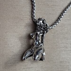 Bound woman kneeling necklace